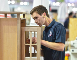 Young person building a cabinet