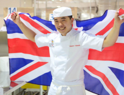 Danny Hoang holding a union jack