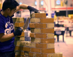 young person bricklaying