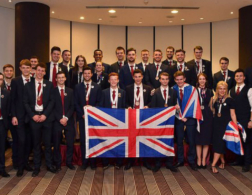 team uk formally dressed with medal and union jack