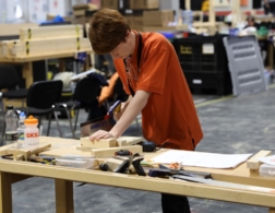 Photo of young person competing in Woodworking Foundation skills