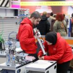 Young people competing in Mechatronics competition