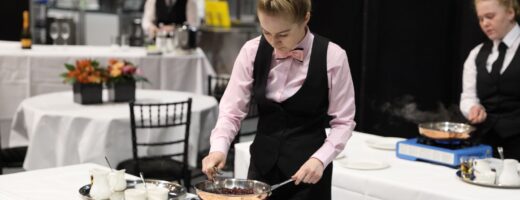 Young person competing in Restaurant Service competition