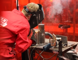 Young person competing in Welding competition