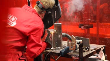 Young person competing in Welding competition